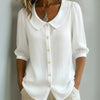 Blus med krage | Knappar